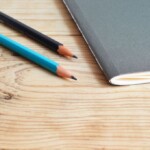 notebook and pencils