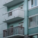 outside of a high apartment building